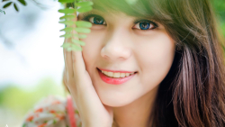 Asian Smiling Blue Eyed Brunette Teen Girl Wallpaper #4244