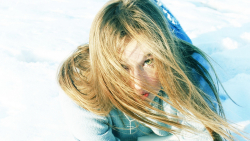 Sexy Green-eyed Long-Haired Blonde Teen Girl Laid On The Snow Wallpaper Face Close-up #7834